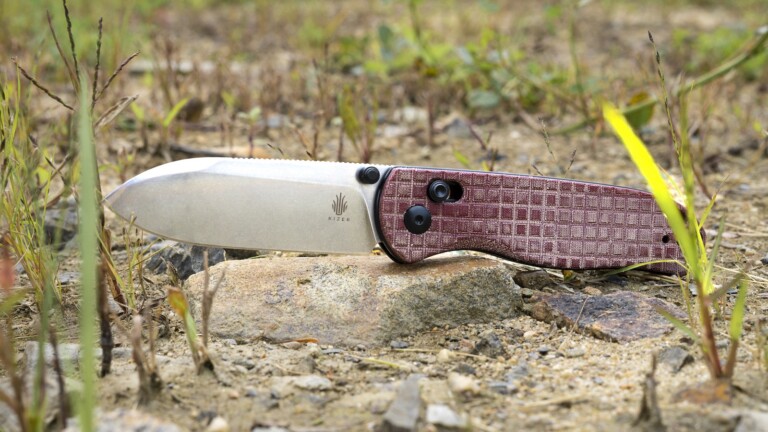 Exclusive Kizer Drop Bear pocket knife has a red micarta handle & stonewashed finish
