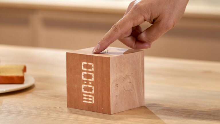 Gingko Cube Plus Clock has a solid wood design and combines a clock, alarm, and stopwatch